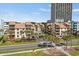 Beautiful condominium complex featuring well-maintained landscaping, a pool, and close proximity to the beach at 5515 N Ocean Blvd. N # 206, Myrtle Beach, SC 29577