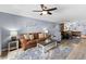 Relaxing living room with a comfy couch and chair, complemented by beachy decor at 5515 N Ocean Blvd. N # 206, Myrtle Beach, SC 29577