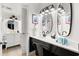 Bright bathroom with double mirrors, modern vanity, and chic lighting for a spa-like experience at 5523 N Ocean Blvd. # 2006, Myrtle Beach, SC 29577