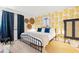 Charming bedroom featuring a comfortable bed, pineapple wallpaper, and stylish decor at 5523 N Ocean Blvd. # 2006, Myrtle Beach, SC 29577