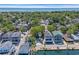 Aerial view of blue home near the water with nearby community amenities and lush landscaping at 6001 - Q21 South Kings Hwy., Myrtle Beach, SC 29575