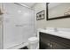 Bright bathroom with a sleek glass-enclosed shower, modern vanity, and elegant fixtures at 6001 - Q21 South Kings Hwy., Myrtle Beach, SC 29575