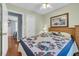 Comfortable bedroom featuring hardwood floors, a ceiling fan, and a serene ambiance for relaxation at 6001 - Q21 South Kings Hwy., Myrtle Beach, SC 29575
