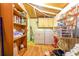 Functional laundry room with wooden shelves, washer, dryer, and ample storage space at 609 3Rd Ave. N, Myrtle Beach, SC 29577
