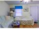 Cozy living room with natural light, featuring hardwood floors and sofas with protective sheets at 609 3Rd Ave. N, Myrtle Beach, SC 29577