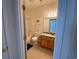 Bright bathroom featuring a tub and shower combination, granite countertop and tile flooring at 618 Cypress Dr., Surfside Beach, SC 29575