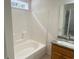 Bathroom featuring tub and shower, with vanity and granite countertop at 618 Cypress Dr., Surfside Beach, SC 29575