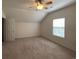 Neutral bedroom featuring carpet, window and a ceiling fan at 618 Cypress Dr., Surfside Beach, SC 29575