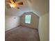 Neutral bedroom featuring carpet, window, and a ceiling fan at 618 Cypress Dr., Surfside Beach, SC 29575