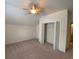 Neutral bedroom featuring carpet, a window and an open closet at 618 Cypress Dr., Surfside Beach, SC 29575