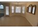 Dining area with natural light, tiled floors, and views of backyard at 618 Cypress Dr., Surfside Beach, SC 29575