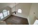 Bright living room with vaulted ceilings, fan, and hardwood flooring at 618 Cypress Dr., Surfside Beach, SC 29575