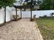 Wooden pergola with built-in benches in the bricked patio area at 618 Cypress Dr., Surfside Beach, SC 29575