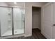 Modern bathroom featuring a glass-enclosed shower and open closet at 6619 Colonial Dr., Myrtle Beach, SC 29572