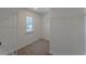 Walk-in closet with wire shelving and a window at 6619 Colonial Dr., Myrtle Beach, SC 29572