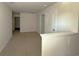 Hallway with neutral carpet and white doors at 6619 Colonial Dr., Myrtle Beach, SC 29572