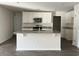 Kitchen featuring granite countertops, white cabinets, and stainless steel appliances at 6619 Colonial Dr., Myrtle Beach, SC 29572