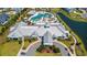 Beautiful aerial view of the community clubhouse, highlighting the pool and well-manicured landscaping at 6850 Belancino Blvd., Myrtle Beach, SC 29579