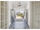 Elegant foyer with decorative tile flooring, stylish lighting, and an inviting view at 6850 Belancino Blvd., Myrtle Beach, SC 29579