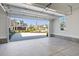 Clean, spacious garage with an open door, offering ample parking and storage space at 6850 Belancino Blvd., Myrtle Beach, SC 29579