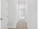 Bright hallway with wood-style floors and arched doorway at 6850 Belancino Blvd., Myrtle Beach, SC 29579