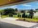 Charming covered patio with wood ceiling and tile flooring, perfect for outdoor entertaining at 6850 Belancino Blvd., Myrtle Beach, SC 29579