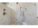 Modern shower with marble tile, and shower head at 6850 Belancino Blvd., Myrtle Beach, SC 29579