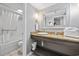 Bathroom with a vessel sink, granite counters, and shower with curtain at 6900 N Ocean Blvd. # 834, Myrtle Beach, SC 29577