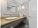 Modern bathroom with granite countertops, vanity, and ample lighting at 6900 N Ocean Blvd. # 834, Myrtle Beach, SC 29577