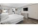Well-lit bedroom with a queen bed and a view to the kitchenette at 6900 N Ocean Blvd. # 834, Myrtle Beach, SC 29577