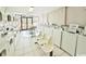 Bright, clean laundry room with rows of machines and seating, for communal convenience at 6900 N Ocean Blvd. # 834, Myrtle Beach, SC 29577