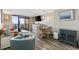 Well-decorated living space features a balcony with ocean views and comfortable seating at 6900 N Ocean Blvd. # 834, Myrtle Beach, SC 29577