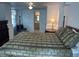 Comfortable bedroom with a queen-sized bed and en-suite bathroom at 710 S Waccamaw Dr., Garden City Beach, SC 29576