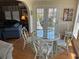 Bright breakfast nook featuring a round table, four chairs, and natural light at 710 S Waccamaw Dr., Garden City Beach, SC 29576