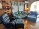 Cozy living room featuring wood paneling and comfortable seating at 710 S Waccamaw Dr., Garden City Beach, SC 29576