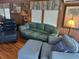 Living room area featuring hardwood floors and cozy seating at 710 S Waccamaw Dr., Garden City Beach, SC 29576