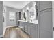 Spacious bathroom features dual sinks, modern fixtures, and a glass-enclosed shower at 7356 Johnson Shortcut Rd., Conway, SC 29527