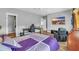 Spacious bedroom featuring wood floors, a comfortable bed, and ample natural light, perfect for relaxation at 7356 Johnson Shortcut Rd., Conway, SC 29527