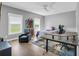 Cozy bedroom with natural light, hardwood floors, and neutral walls, providing a relaxing retreat at 7356 Johnson Shortcut Rd., Conway, SC 29527