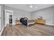 This bedroom has great light, beautiful floors, a ceiling fan, and a convenient laundry closet at 7356 Johnson Shortcut Rd., Conway, SC 29527
