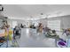 Spacious garage with epoxy flooring, multiple doors and lighting; plenty of room for parking and storage at 7356 Johnson Shortcut Rd., Conway, SC 29527
