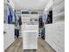 Walk-in closet features custom shelving, drawers, and ample space for organization at 7356 Johnson Shortcut Rd., Conway, SC 29527
