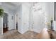 Bright foyer with tile floors, a decorative chandelier, and an elegant entryway at 755 Wintercreeper Dr., Longs, SC 29568