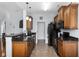 Well-equipped kitchen featuring sleek countertops and a full suite of black appliances at 755 Wintercreeper Dr., Longs, SC 29568