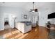 Spacious living room with an open layout, flowing into the kitchen and dining area at 755 Wintercreeper Dr., Longs, SC 29568