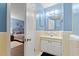 Bathroom connecting to bedroom with vanity and sink, providing convenience and functionality at 800 9Th Ave. S # N-1, North Myrtle Beach, SC 29582