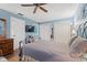 Inviting bedroom with wood-look floors, TV, dresser, and ample closet space at 800 9Th Ave. S # N-1, North Myrtle Beach, SC 29582