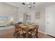 Charming dining room offers a wooden table, seating for six, and access to living space at 800 9Th Ave. S # N-1, North Myrtle Beach, SC 29582