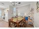 Open dining room connected to the living area showcasing modern lighting at 800 9Th Ave. S # N-1, North Myrtle Beach, SC 29582