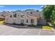 Inviting townhome exterior featuring unique architectural details and manicured landscaping at 800 9Th Ave. S # N-1, North Myrtle Beach, SC 29582
